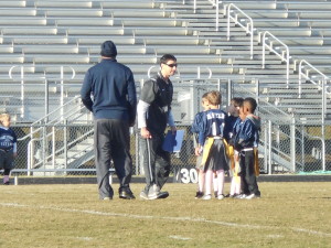 Knute Russo inspiring his 7 year old defensive players.