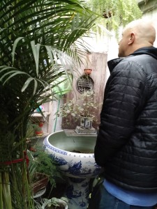 Don finds a relaxing spot in the hutong.