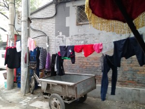 Laundry hanging in the street.