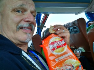 Don eating "fermented soybean prawn" flavored Lay's potato chips. 