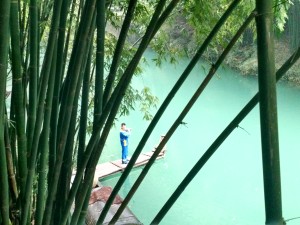 traditional courting ritual guy plays a flute to a girl on a boat