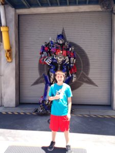 Optimus Prime photobombing Damian.