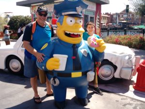 The boys run into Chief Wiggum in Springfield.