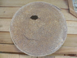 copper sieve for pouring shot.