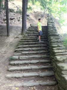 Stairs leading up from the creek bed.