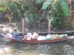 Vendor on the way to market